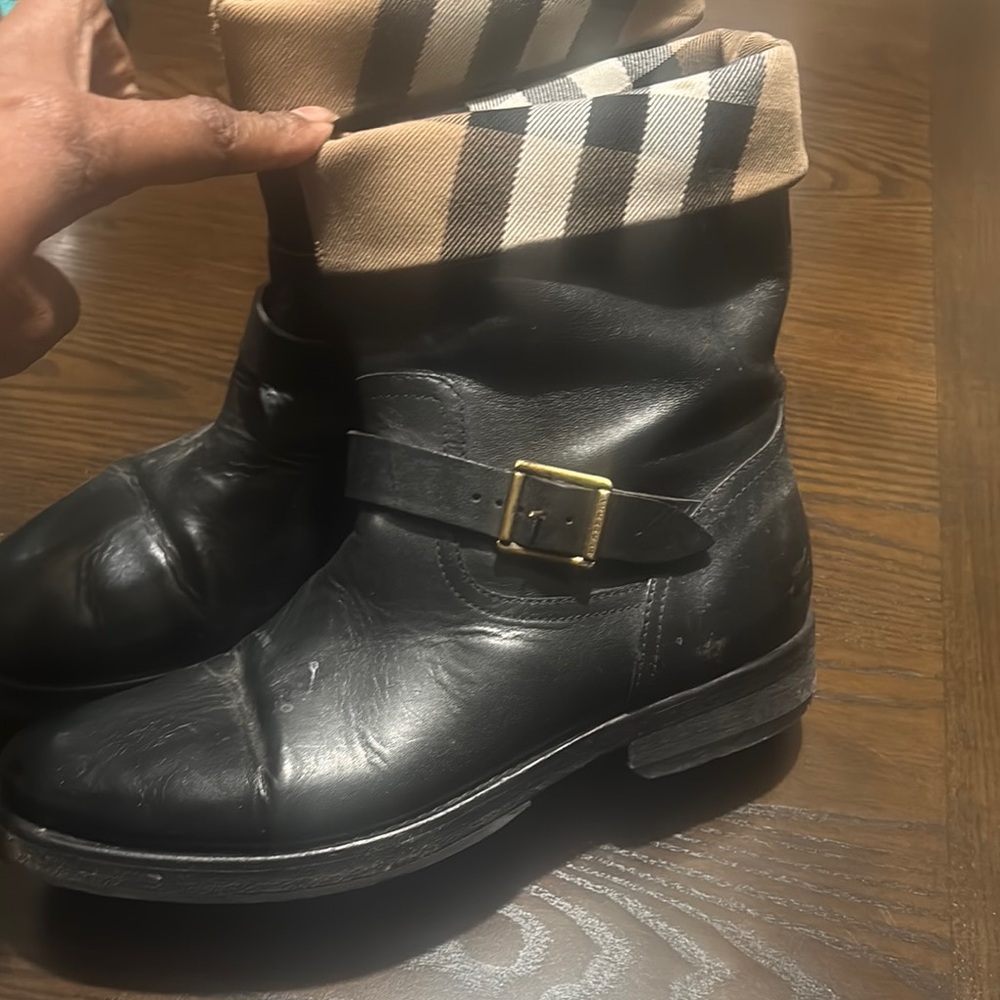 Burberry Black Leather Ankle Boots with Tan Plaid Cuff. Will wipe off b4 I ship